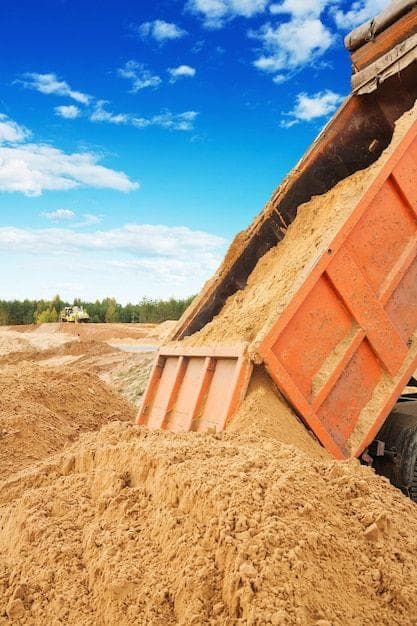 truck unloading sand